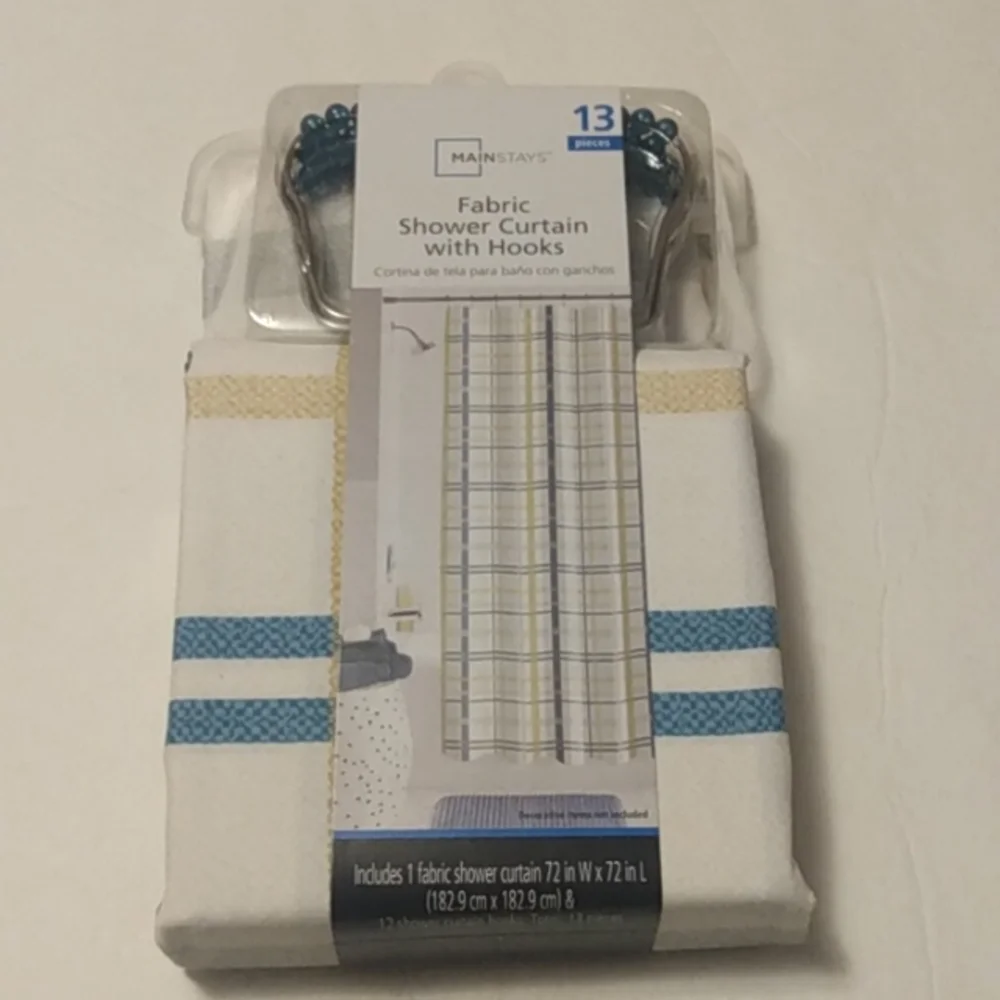 Mainstays 13 piece lightweight multi-colored printed fabric shower curtain.